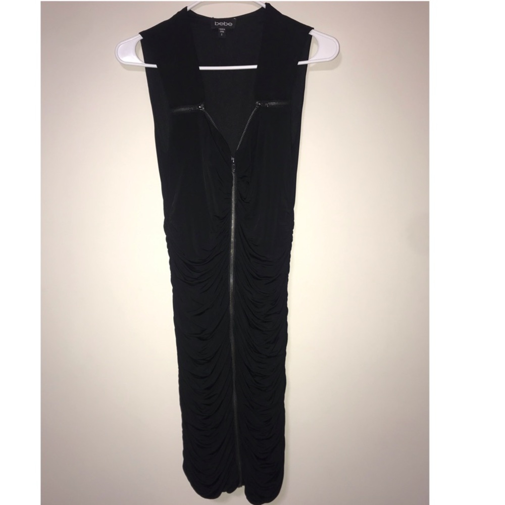 A bebe black dress with a zipper.